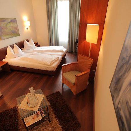 Hotel Mariotto Am Burghof Лёррах Экстерьер фото